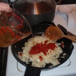 Adding Wine to Onions, Garlic and Tomatoes