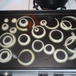 Spread Onions on Roasting Pan
