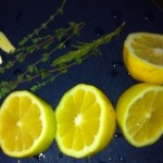 Lemon, Garlic Cloves and Thyme Sprigs