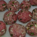 Meatballs formed and ready for the pan